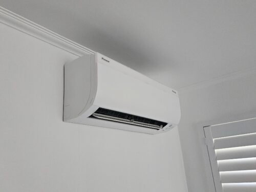 Superheat Electrical Waikato - Heat Pump, air conditioning and ventilation Services - Daikin Cora Installed in a Bedroom Image