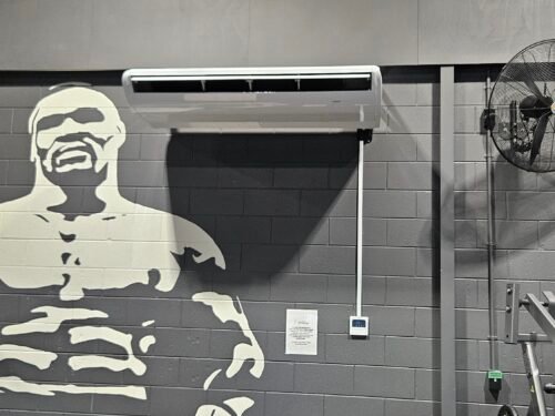 Hitachi Underceiling Heat Pump installation indoor unit in a commercial gym image