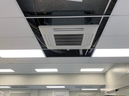 Commercial heat pump cassette unit installation image in the production area