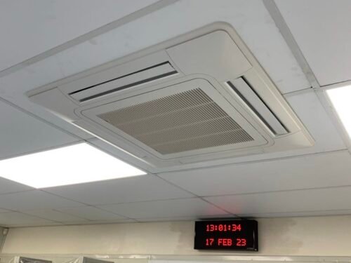 Commercial heat pump cassette unit installation image in the production area