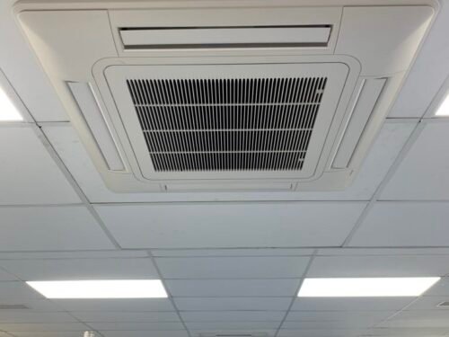 Commercial heat pump cassette unit installation image in the production area