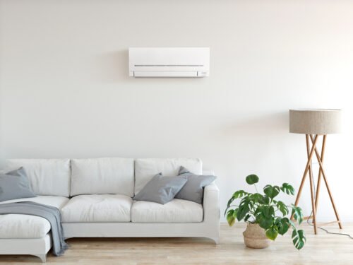 Superheat Electrical Waikato - Heat Pump, air conditioning and ventilation Services -Residential heat pump Mitsubishi AP Series high wall unit Lifestyle Image Mitsubishi Electric Lifestyle Photo Heat Pump in lounge area